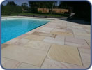 Natural Stone Paving around Swimming Pool