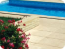 Deco Pool Coping in buff with matching Atlantic paving